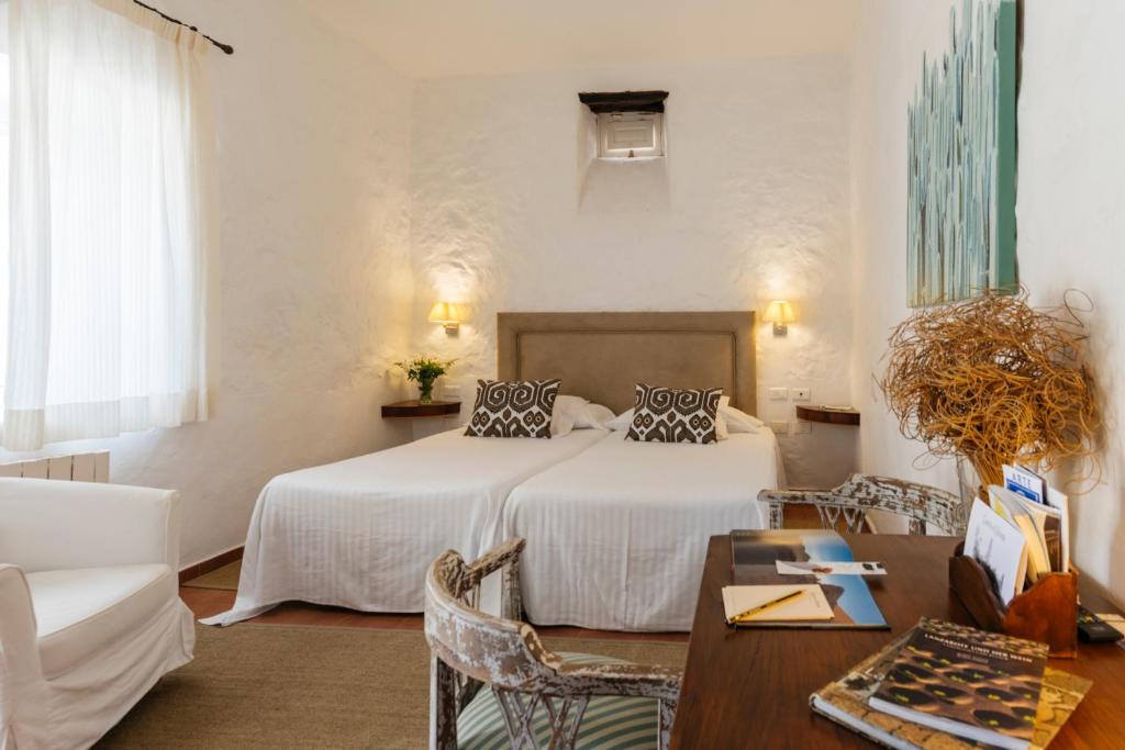 Postel nebo postele na pokoji v ubytování Caserio de Mozaga - Hotel Rural