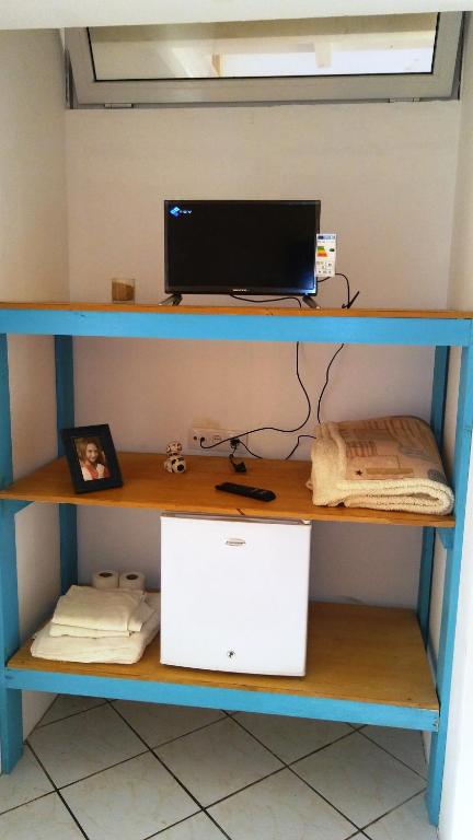 TV a/nebo společenská místnost v ubytování Hostels Holiday Cape Verde