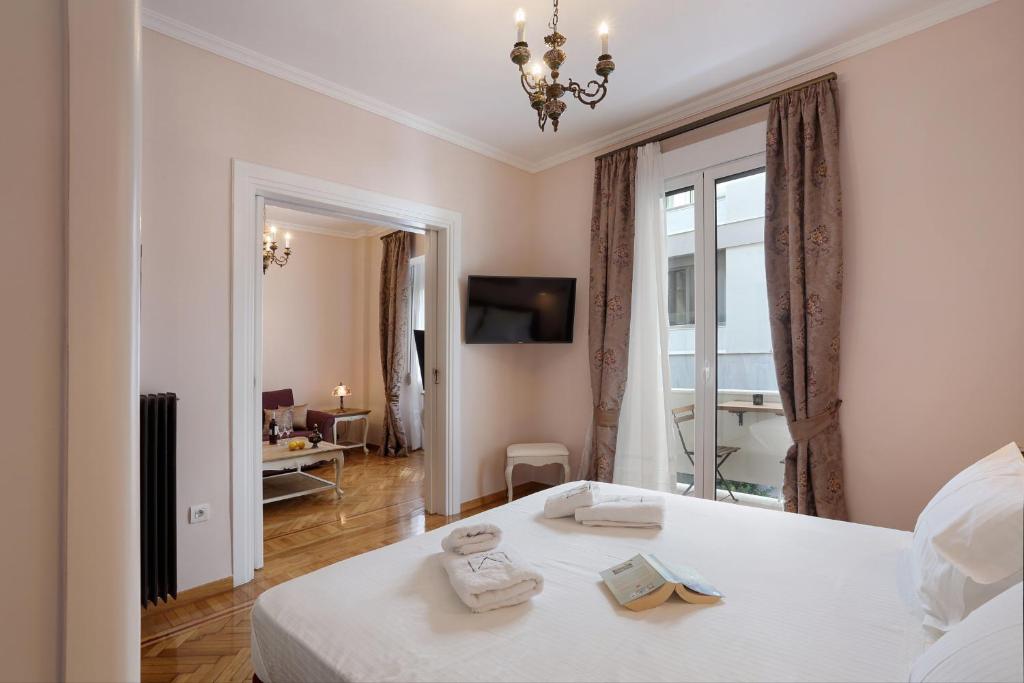 Posteľ alebo postele v izbe v ubytovaní V1935 Luxurious Apartments