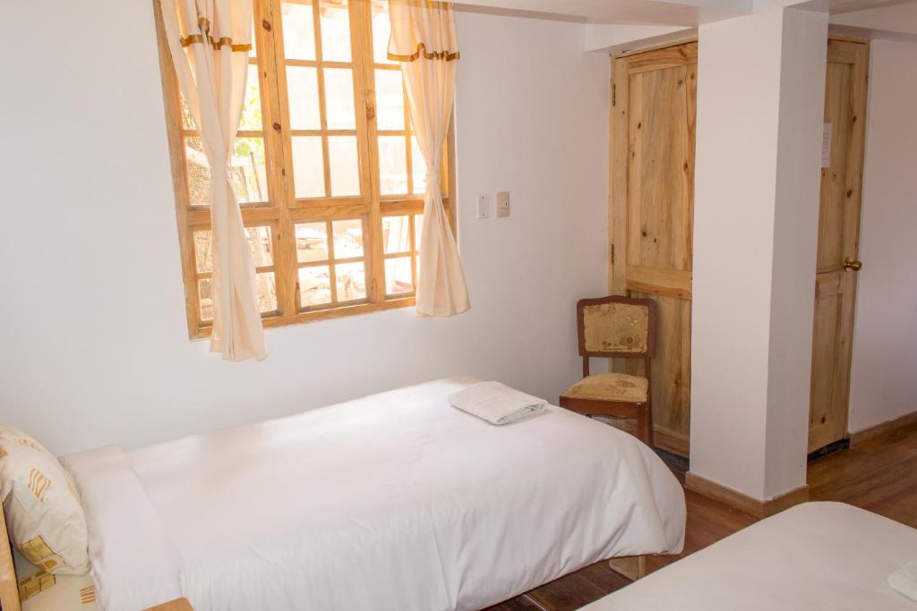Postel nebo postele na pokoji v ubytování Casa Don Jose B & B