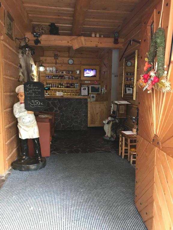 The lounge or bar area at Hotel Koliba