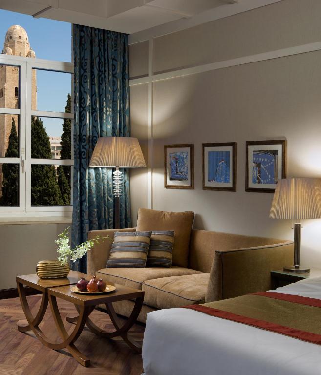 Postel nebo postele na pokoji v ubytování King David Hotel Jerusalem