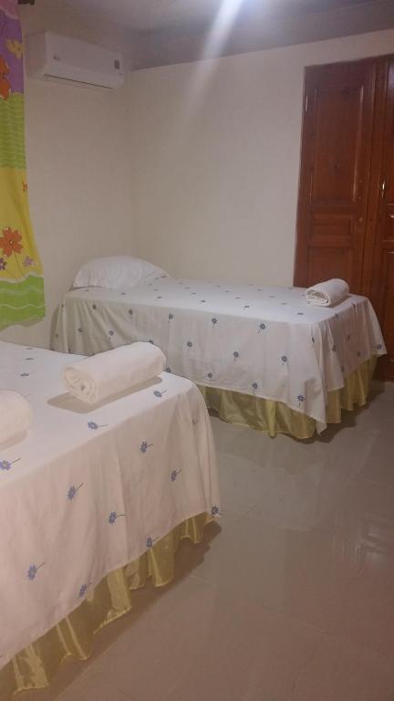 Postel nebo postele na pokoji v ubytování Hostel Quintonido