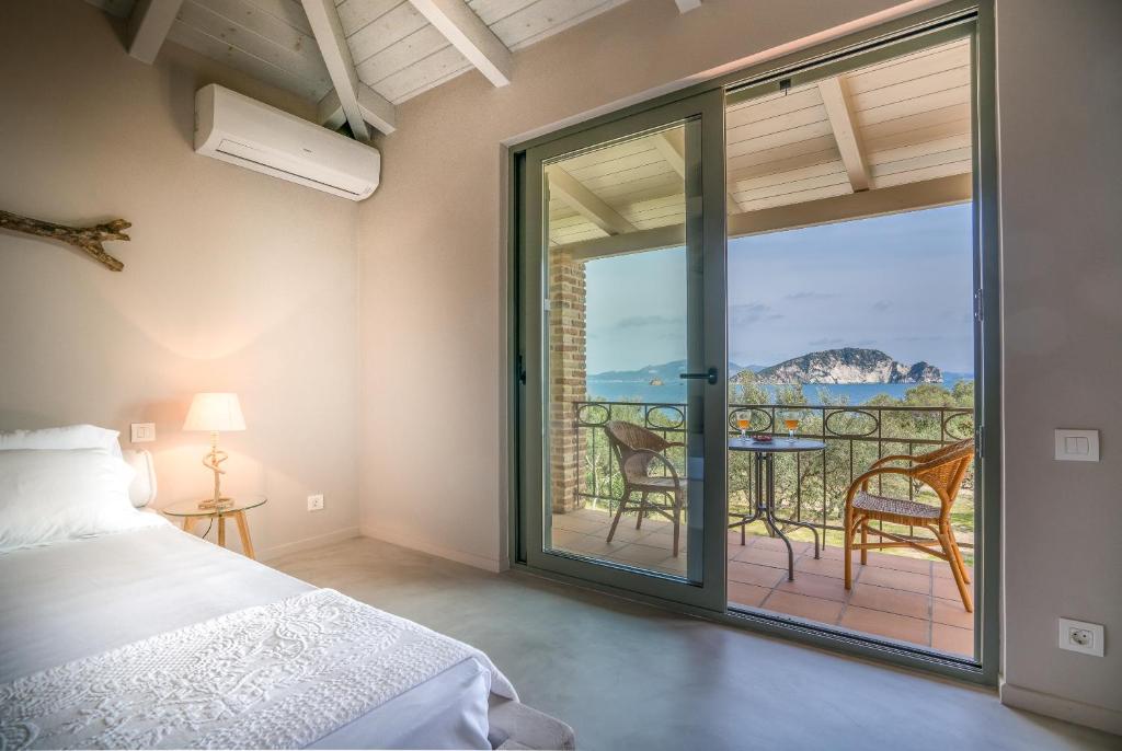 Lithalona Villas & Houses - Pelouzo - Villa à Beira -mar