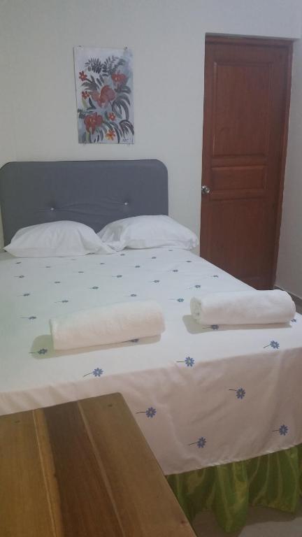 Postel nebo postele na pokoji v ubytování Hostel Quintonido