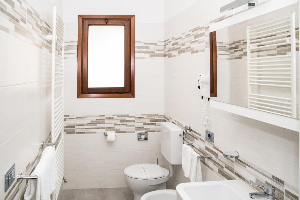 Koupelna v ubytování Albergo Ridente