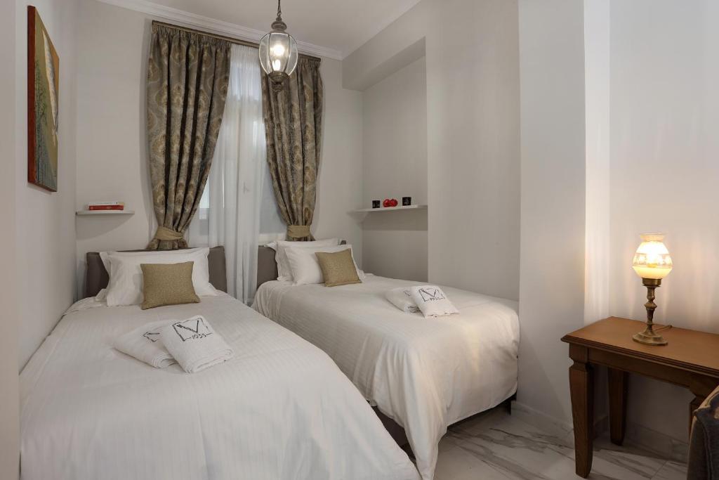 Posteľ alebo postele v izbe v ubytovaní V1935 Luxurious Apartments
