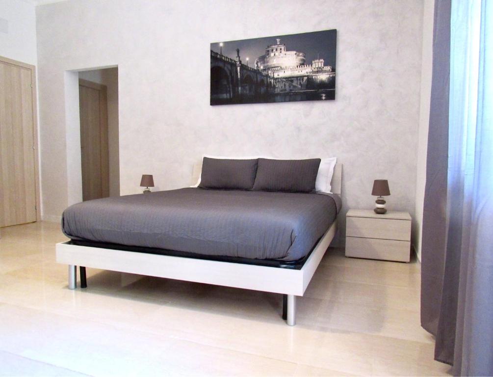 Llit o llits en una habitació de Roema Guest House