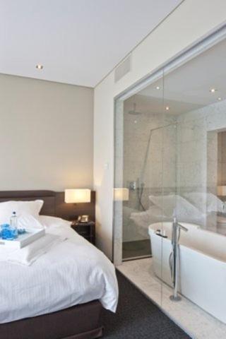 Postel nebo postele na pokoji v ubytování Blue Woods Hotel - Deerlijk