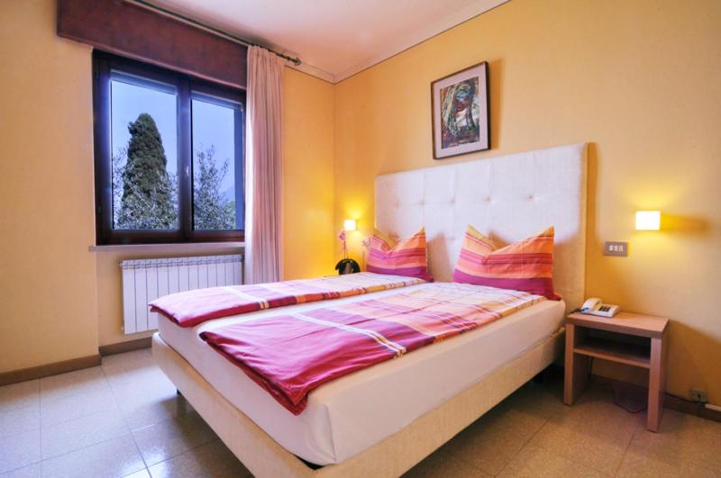 Postel nebo postele na pokoji v ubytování Casa Antonelli
