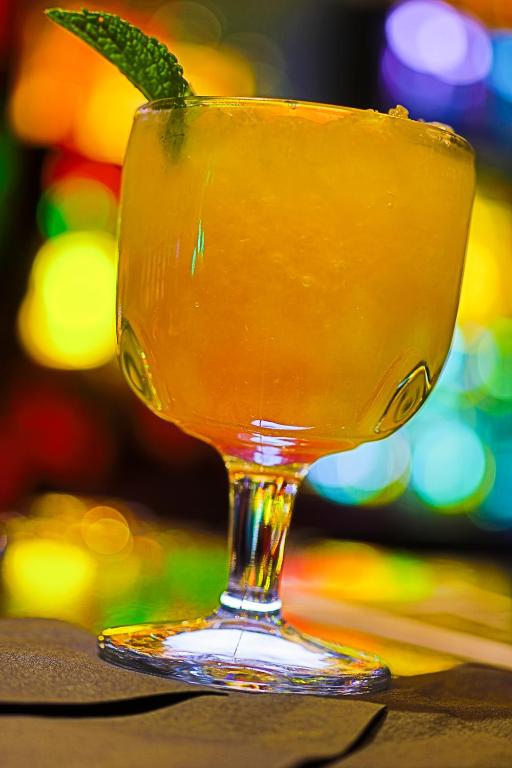 a drink in a glass sitting on a table at Hotel Ruby in Spokane