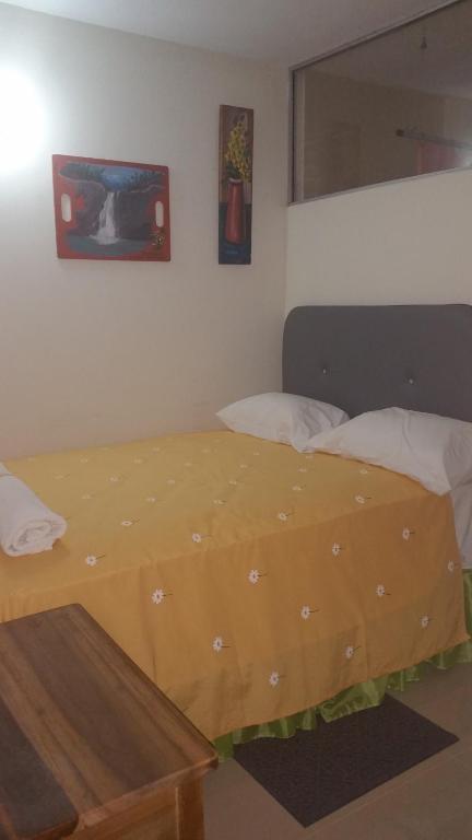 Postel nebo postele na pokoji v ubytování Hostel Quintonido