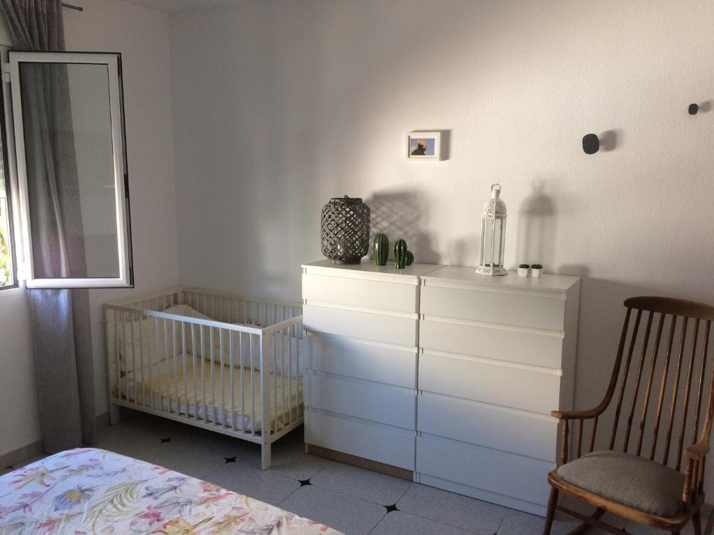 Łóżko lub łóżka w pokoju w obiekcie MOLINO 7