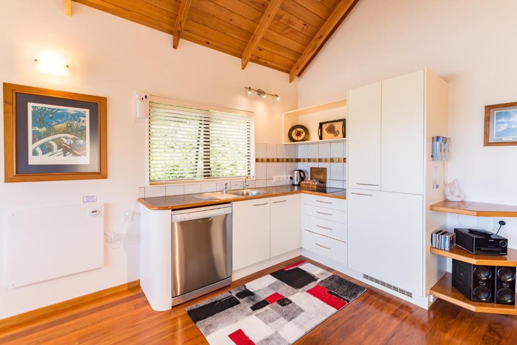 Kuchyň nebo kuchyňský kout v ubytování Abri Apartments