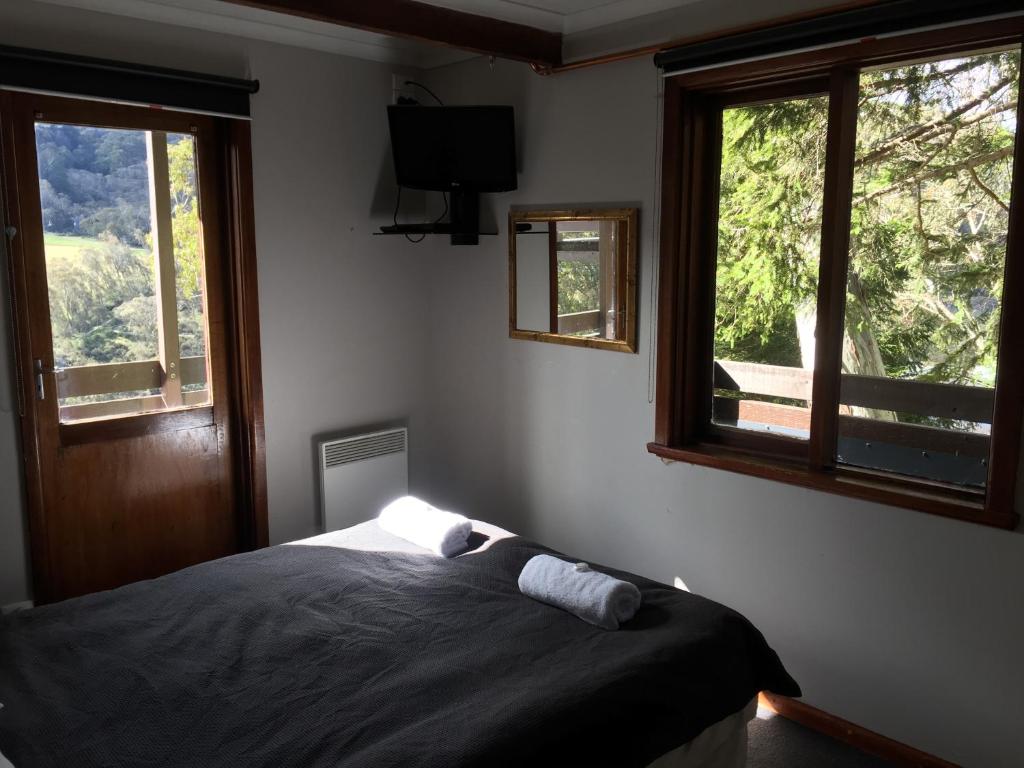 Postel nebo postele na pokoji v ubytování Winterhaus Lodge Thredbo Village