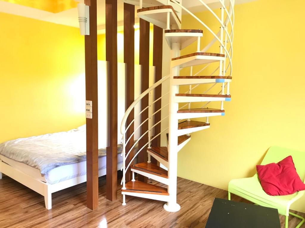 Postel nebo postele na pokoji v ubytování Saint Malo Homestay