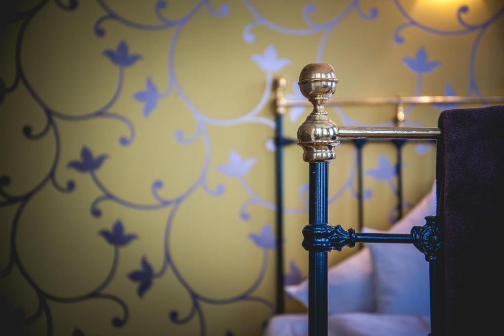 Postel nebo postele na pokoji v ubytování Hotel Alexander