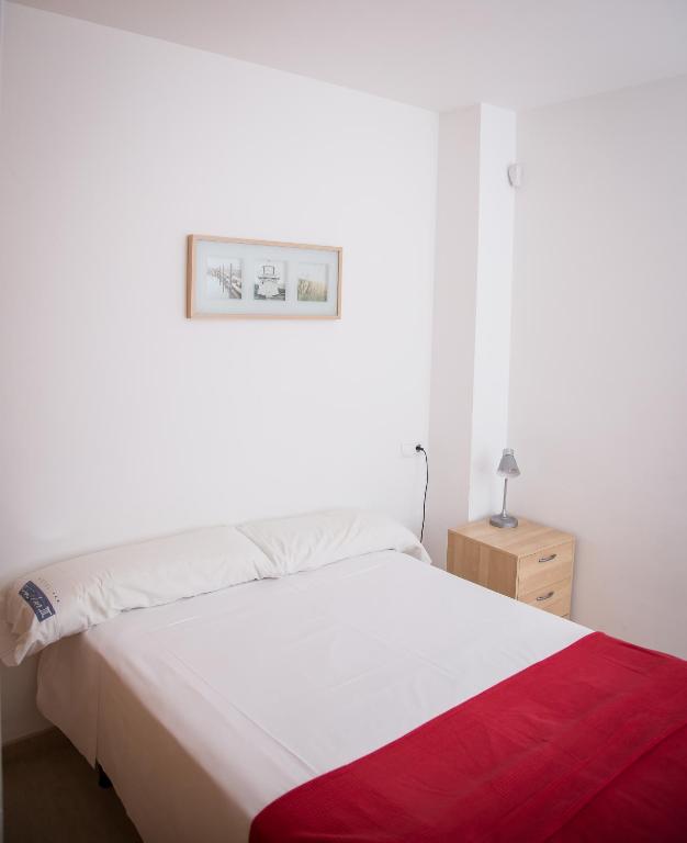 Cama o camas de una habitación en Carlos III