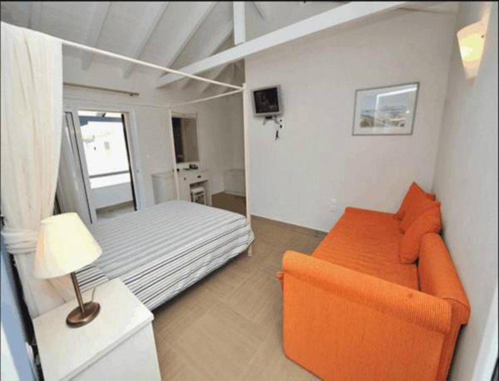 Postel nebo postele na pokoji v ubytování Hotel Agios Nikitas