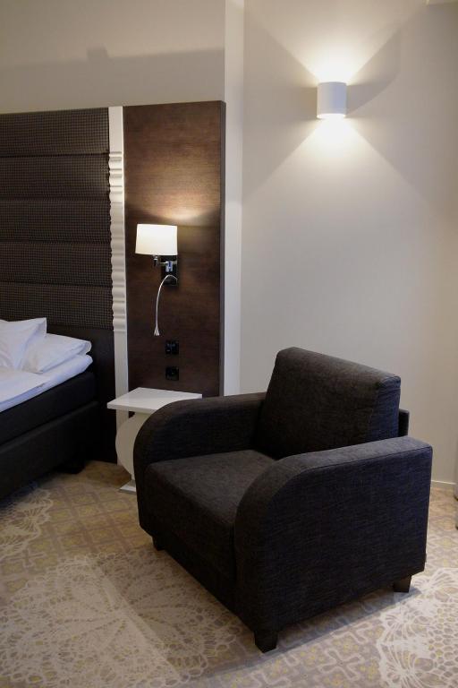 Postel nebo postele na pokoji v ubytování Lydia Hotel
