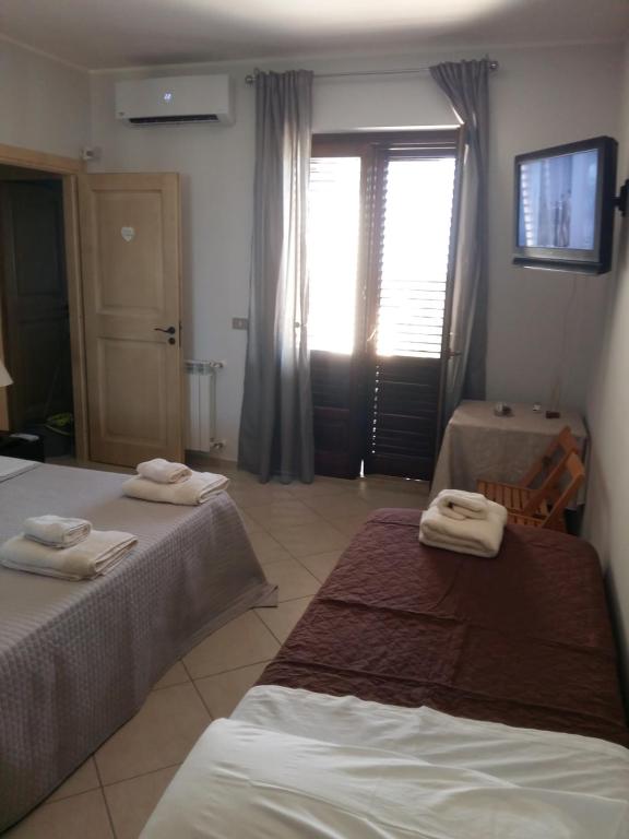 A bed or beds in a room at B&B Lavinaio