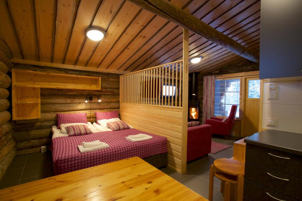 Кровать или кровати в номере Holiday Club Salla Apartments