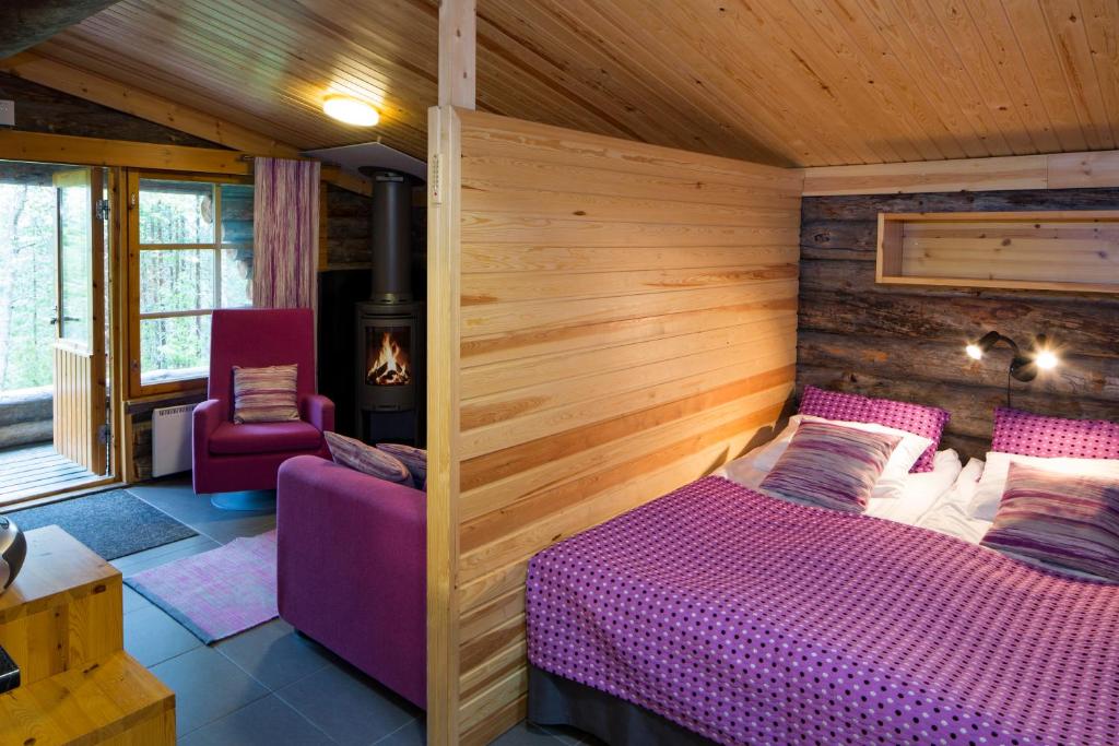 Кровать или кровати в номере Holiday Club Salla Apartments