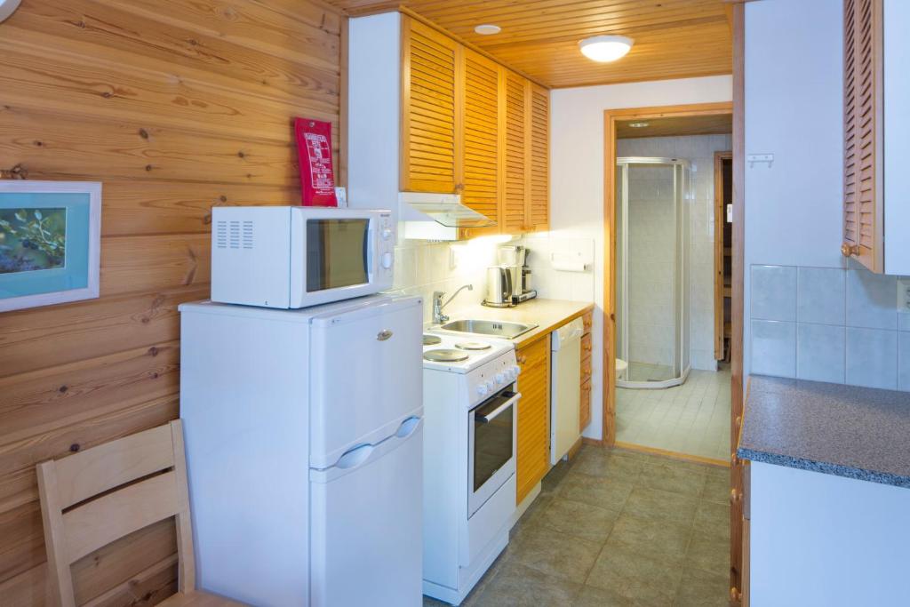 Кухня или мини-кухня в Holiday Club Salla Apartments
