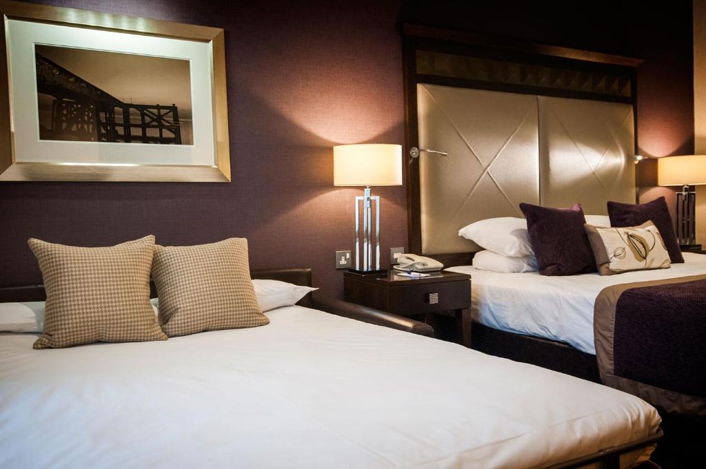 Postel nebo postele na pokoji v ubytování Seamill Hydro Hotel