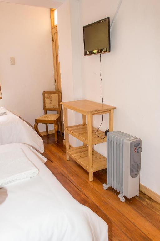 Postel nebo postele na pokoji v ubytování Casa Don Jose B & B