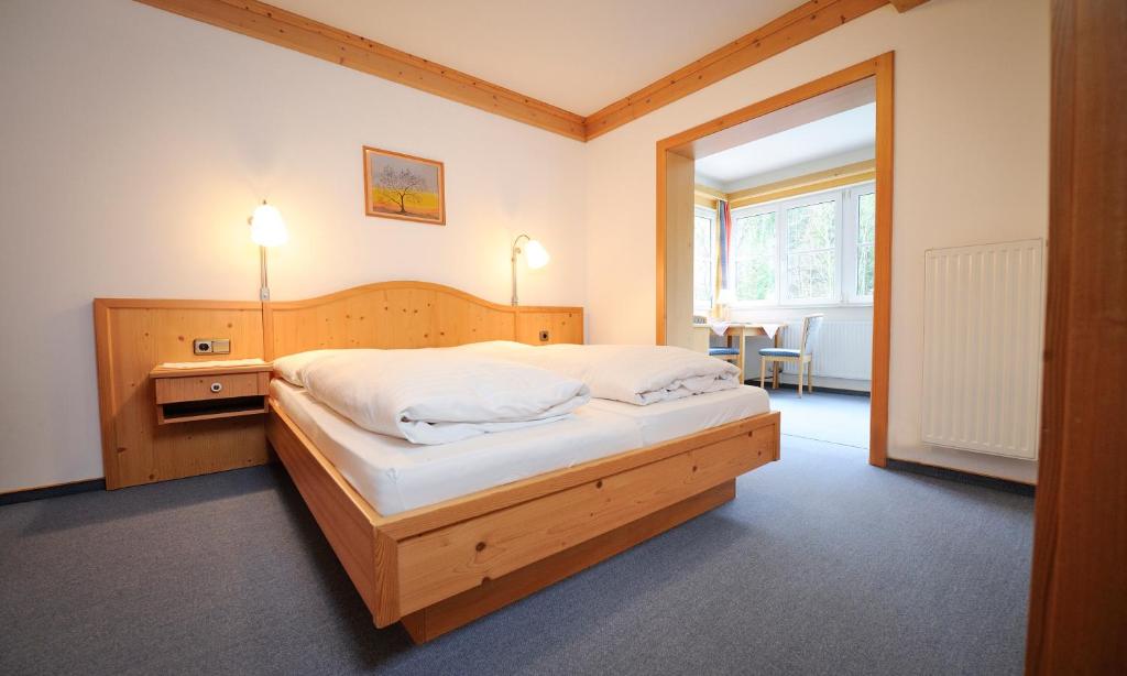 Postel nebo postele na pokoji v ubytování Kalßwirt