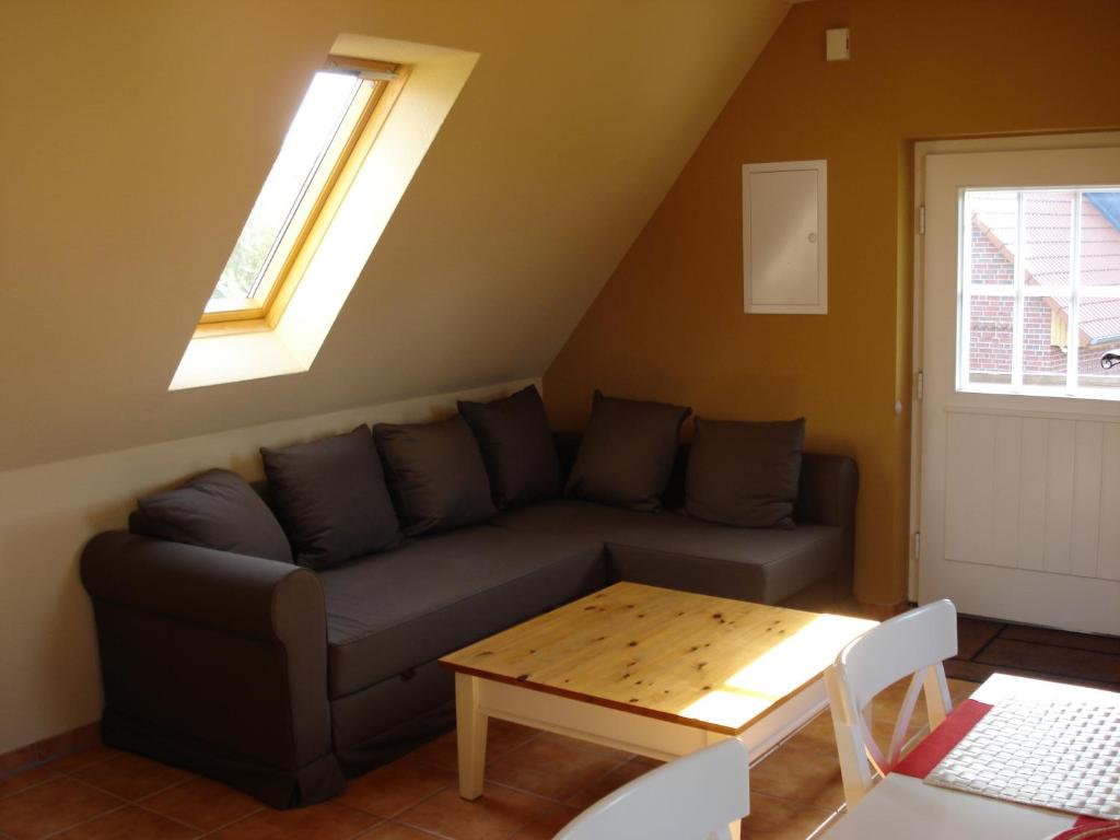 Posezení v ubytování The Cosy Home