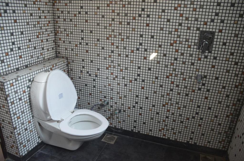 Koupelna v ubytování Goel Residency