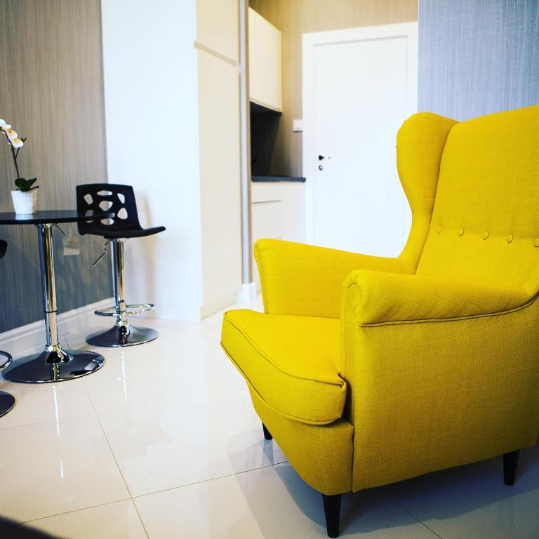 Televízia a/alebo spoločenská miestnosť v ubytovaní Softly Residence