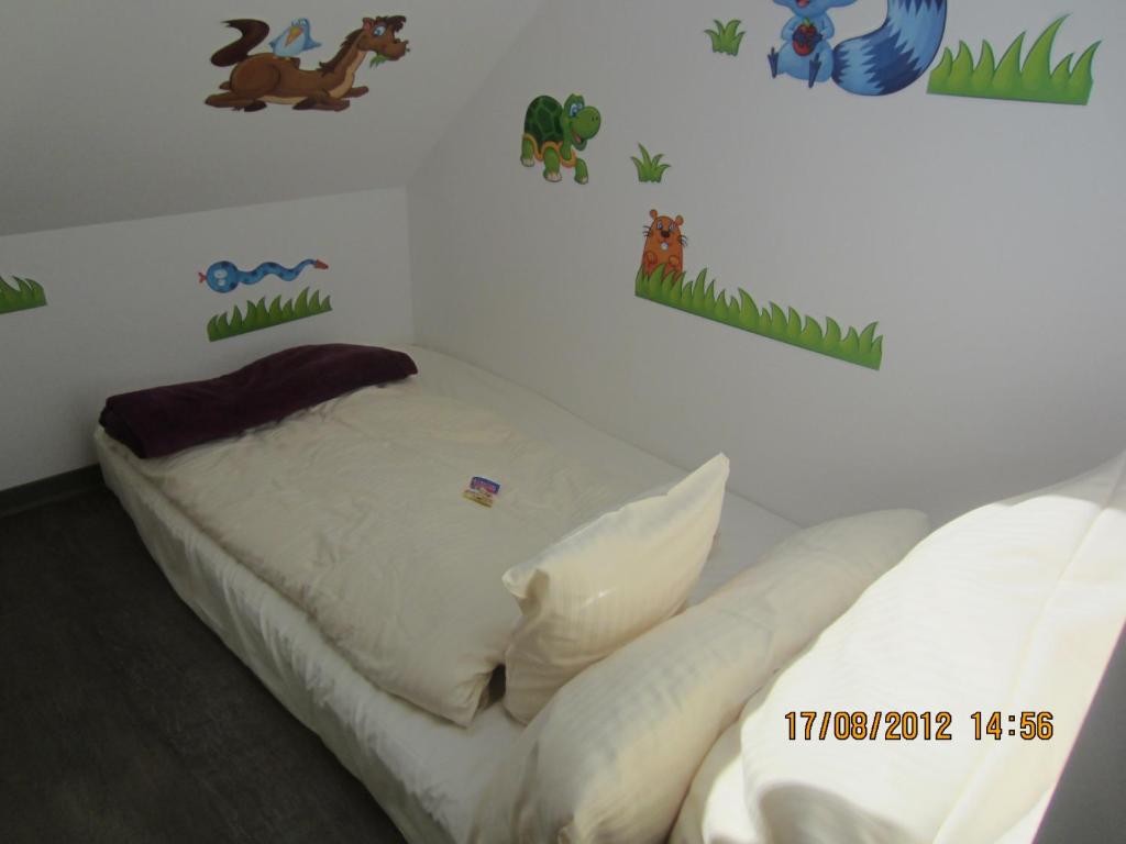Postel nebo postele na pokoji v ubytování Hotel DAH-Inn