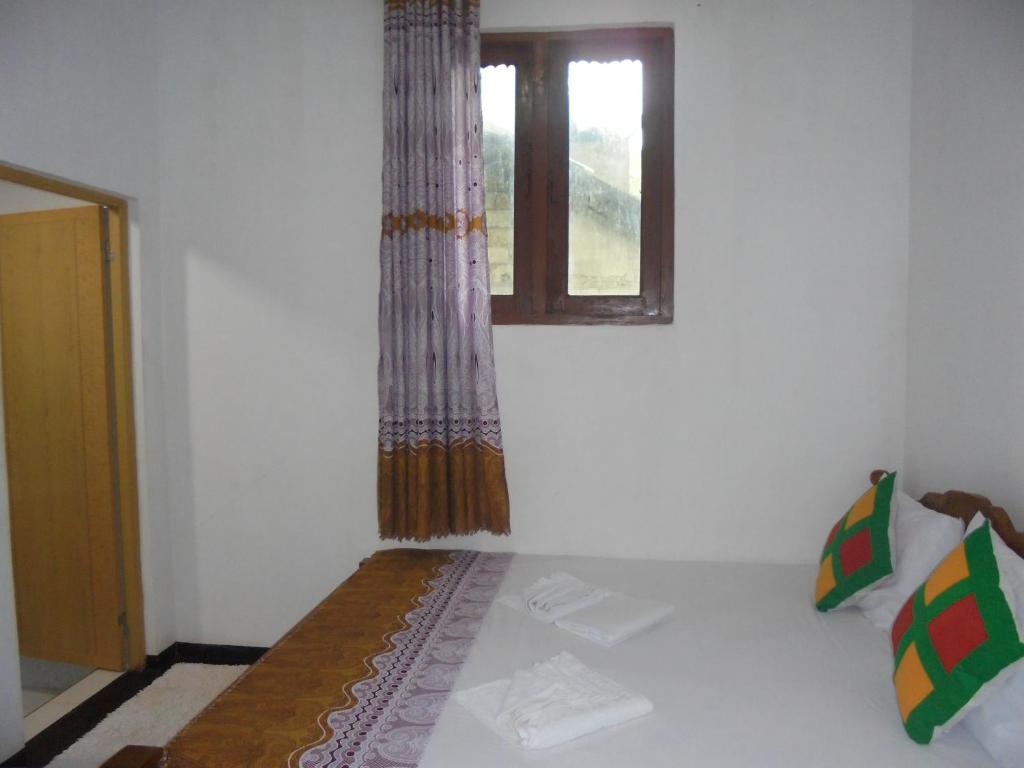 Postel nebo postele na pokoji v ubytování Ath Hala Safari Resort
