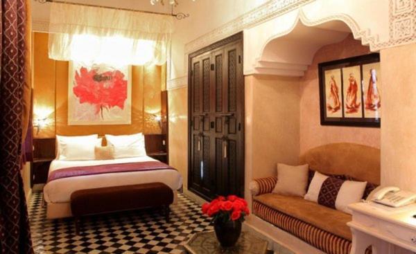 Postel nebo postele na pokoji v ubytování Riad Monceau