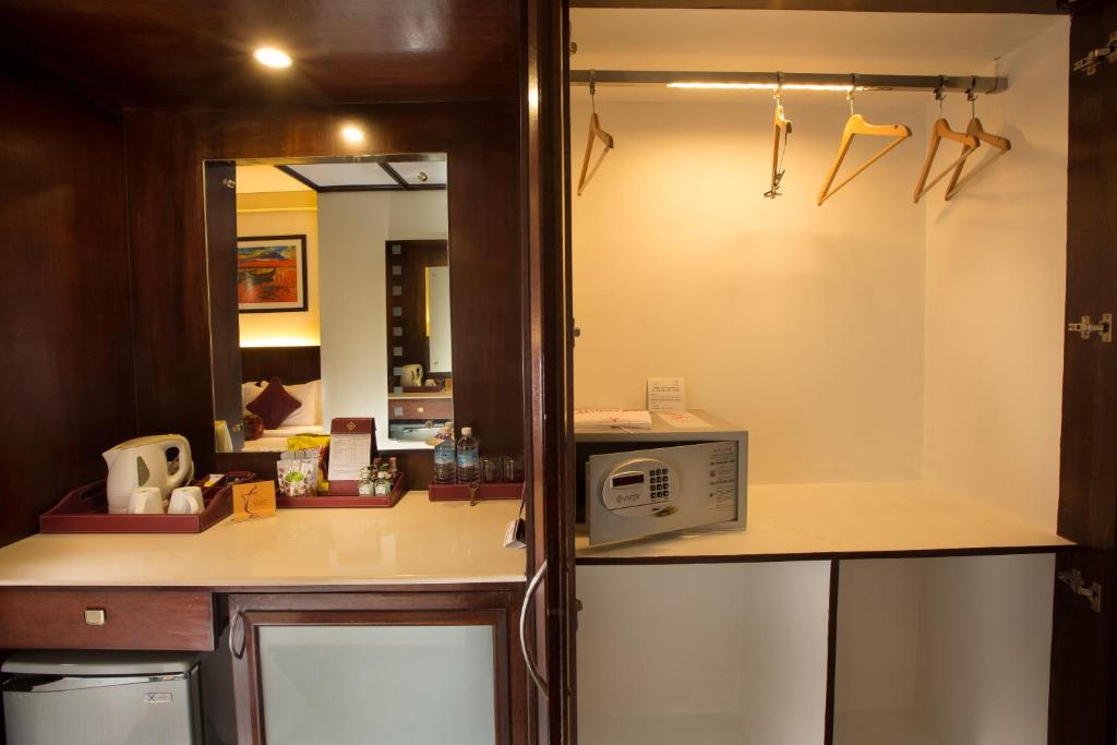 Kuchyň nebo kuchyňský kout v ubytování Hotel Atithi