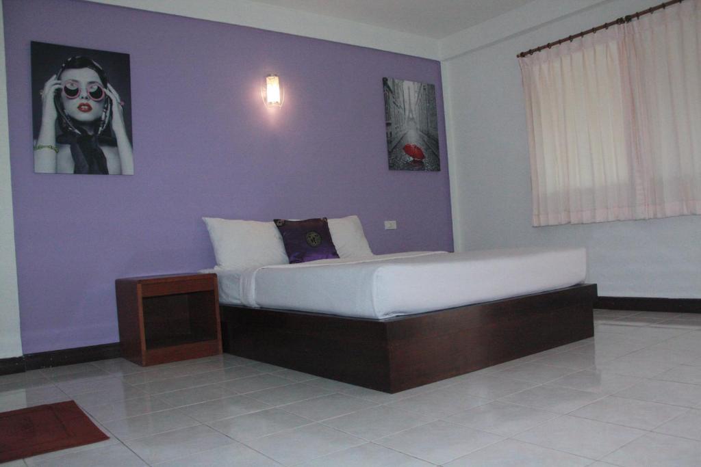 Postel nebo postele na pokoji v ubytování Forum House Hotel Krabi