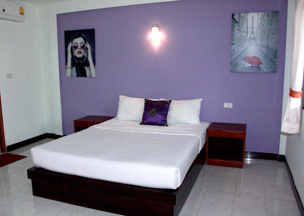 Postel nebo postele na pokoji v ubytování Forum House Hotel Krabi
