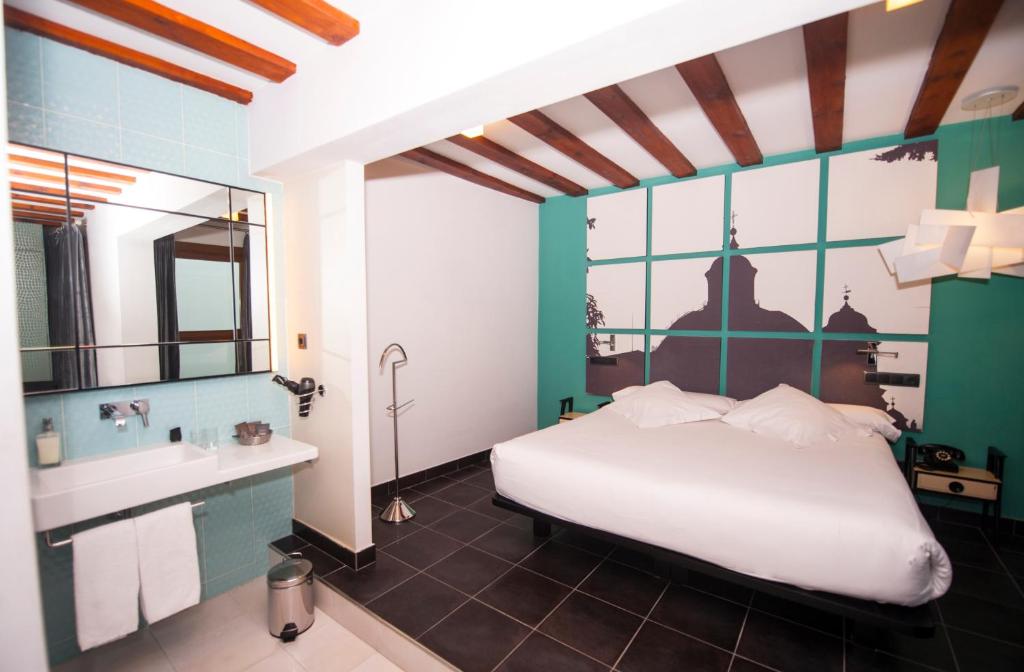 Posada del León de Oro Boutique Hotelにあるベッド