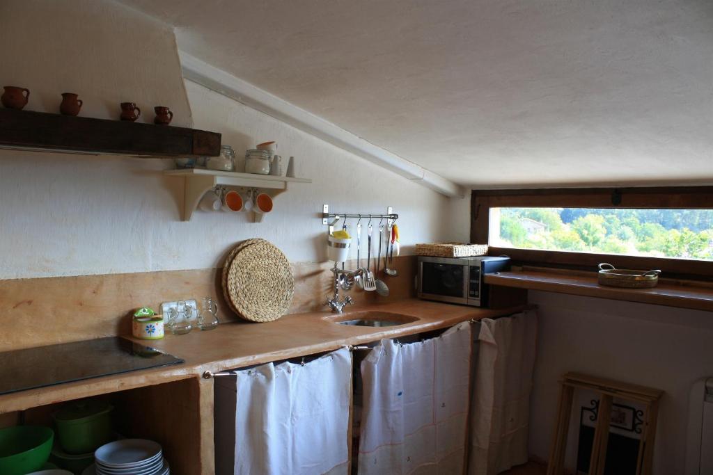 Virtuvė arba virtuvėlė apgyvendinimo įstaigoje Casa Rural La Azotea
