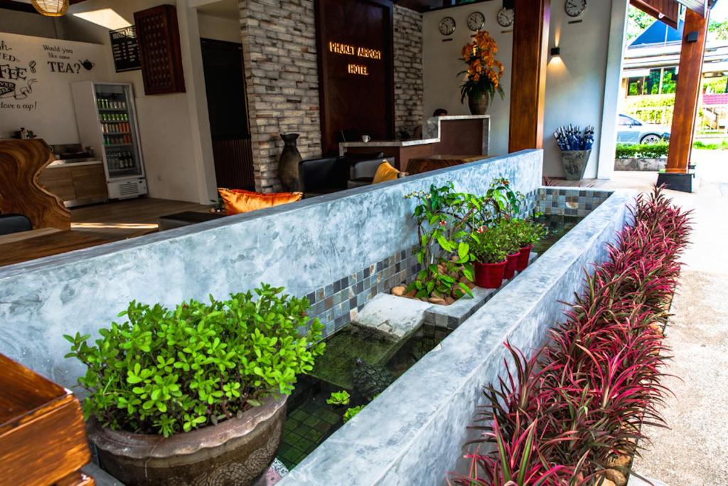 Zahrada ubytování Phuket Airport Hotel - SHA Extra Plus