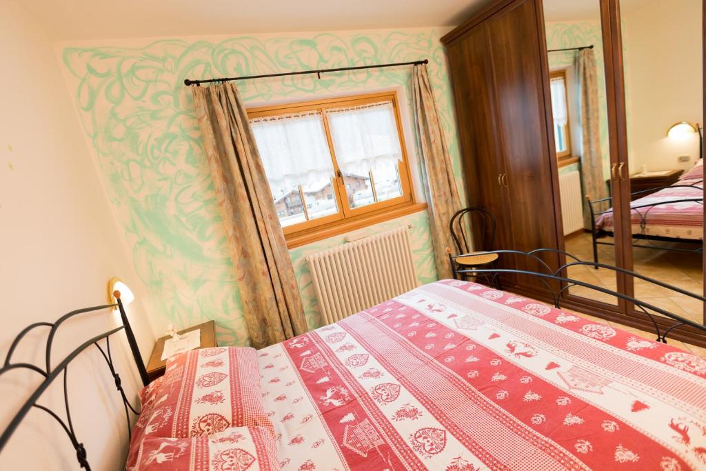 Posteľ alebo postele v izbe v ubytovaní Chalet Aurora