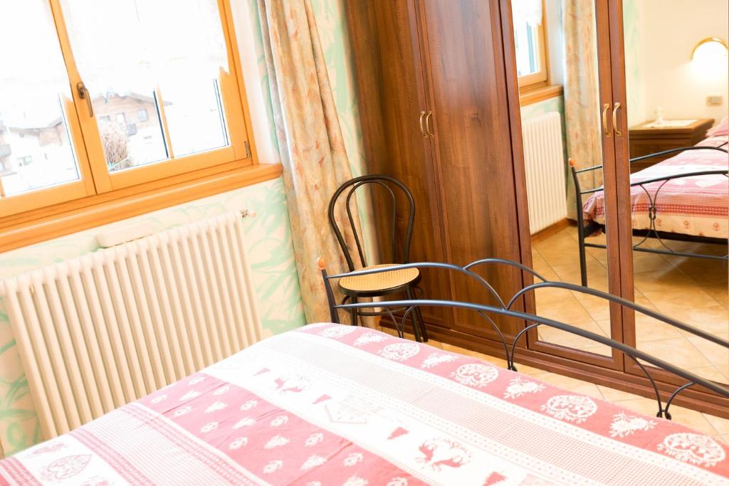 Posteľ alebo postele v izbe v ubytovaní Chalet Aurora