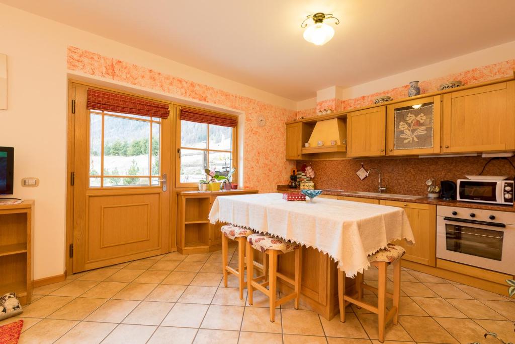 Kuchyňa alebo kuchynka v ubytovaní Chalet Aurora