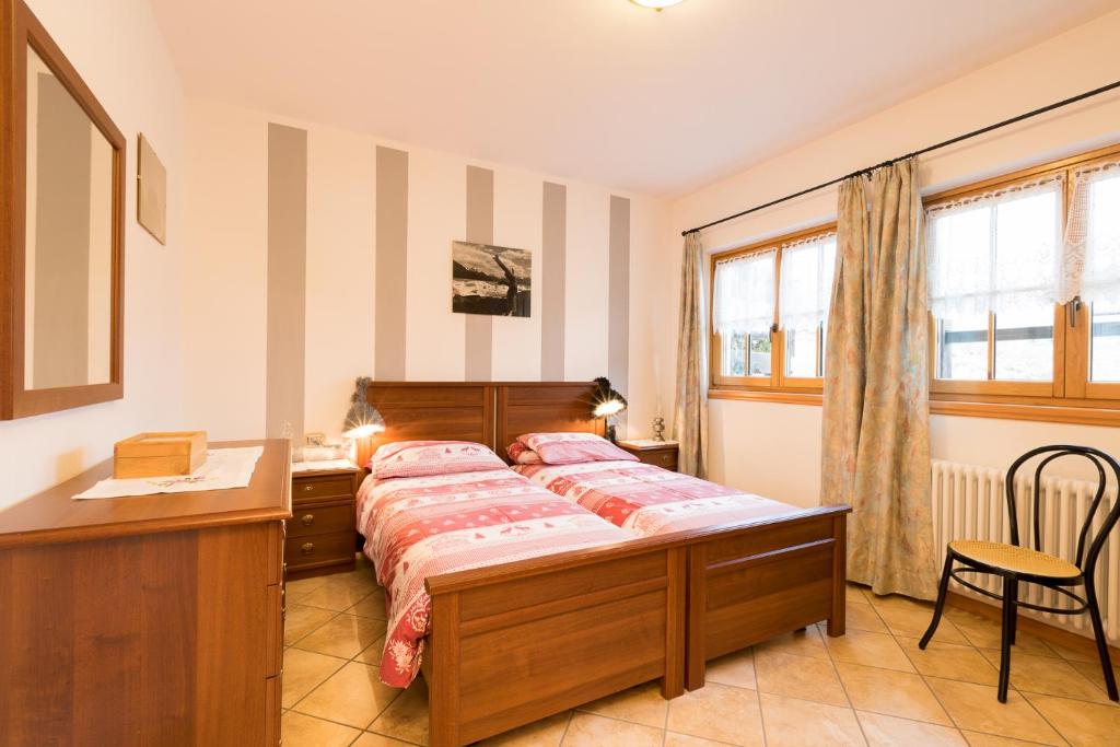 Posteľ alebo postele v izbe v ubytovaní Chalet Aurora