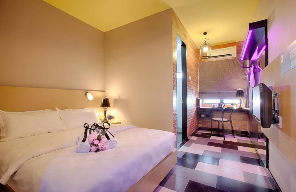 Postel nebo postele na pokoji v ubytování the youniQ Hotel, KLIA T1, KLIA T2