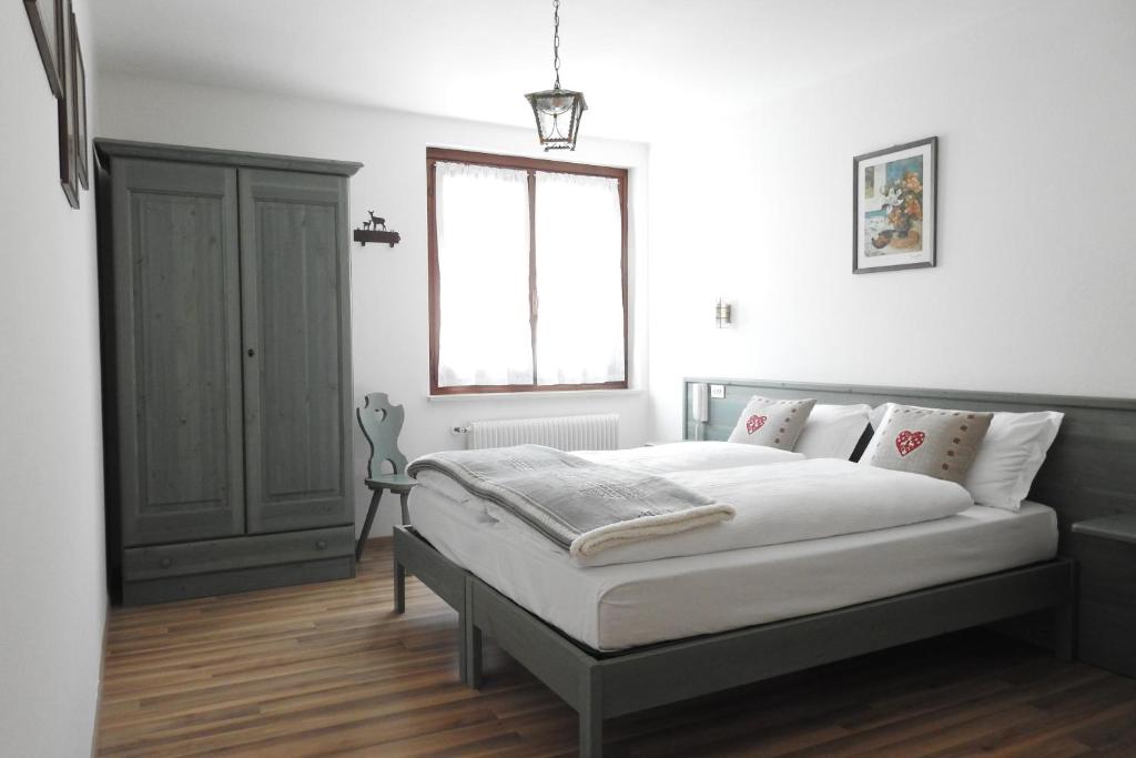 Postel nebo postele na pokoji v ubytování Casa Salvaterra Affittacamere