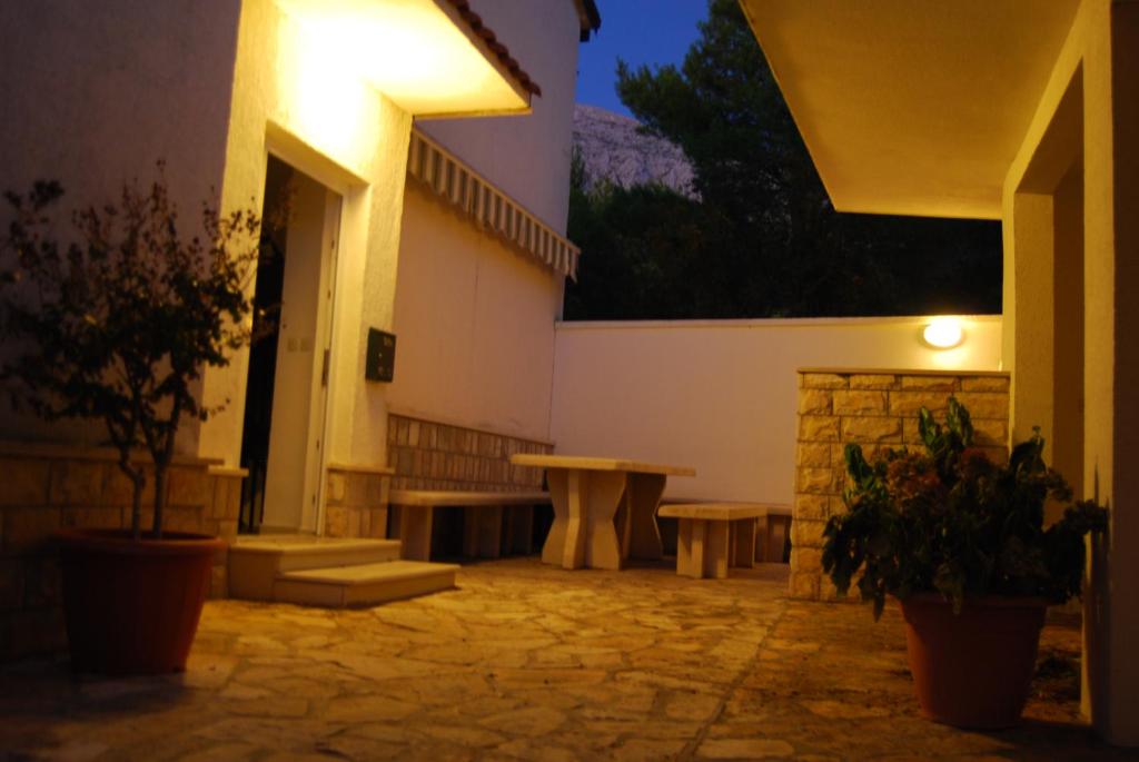 Патио или другая зона на открытом воздухе в Apartments Zovko